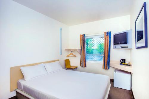 Imagen de la habitación del Hotel COFFS HARBOUR BUDGET STAY. Foto 9