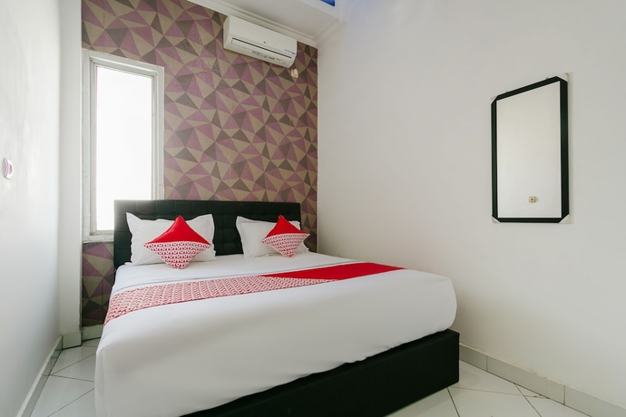 Imagen de la habitación del Hotel COLLECTION O 3428 Marimar. Foto 4