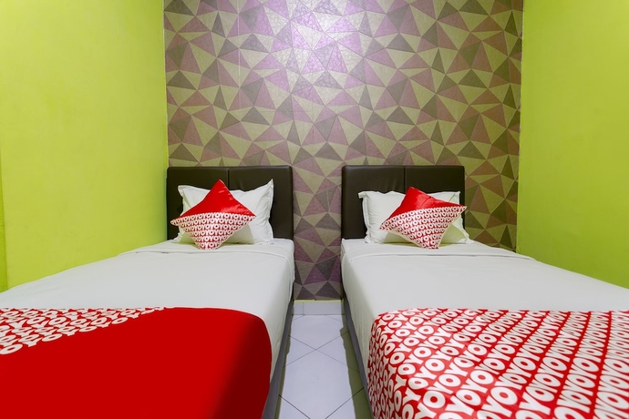 Imagen de la habitación del Hotel COLLECTION O 3428 Marimar. Foto 6