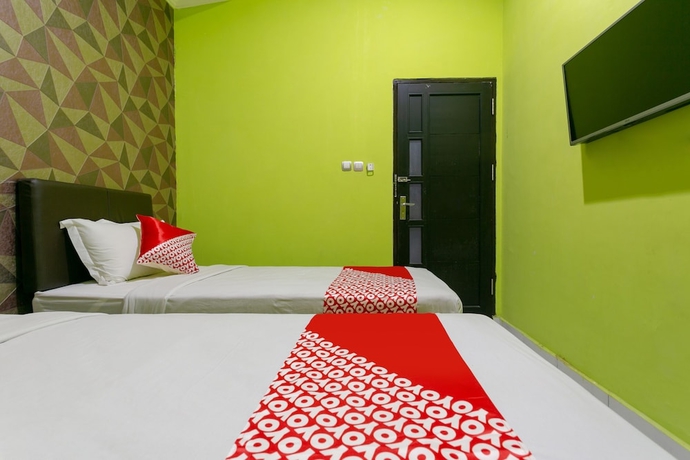 Imagen de la habitación del Hotel COLLECTION O 3428 Marimar. Foto 12