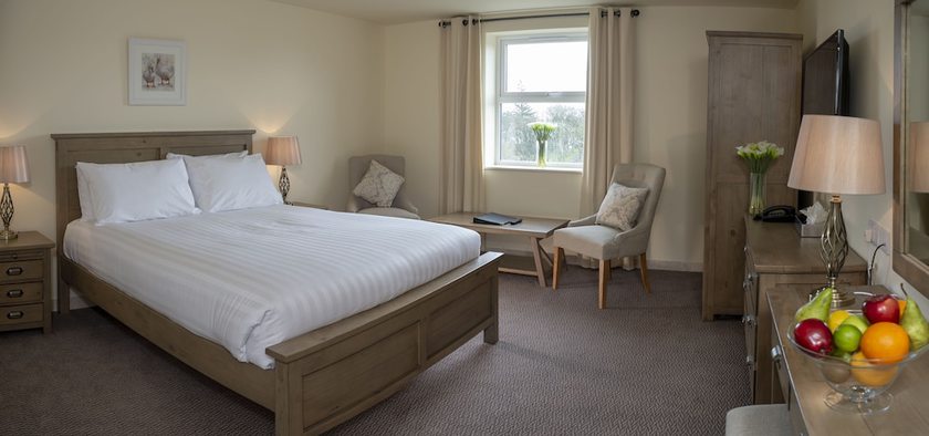 Imagen de la habitación del Hotel COMIS and Golf Resort. Foto 10