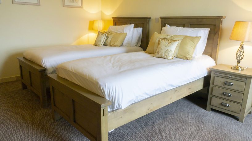 Imagen de la habitación del Hotel COMIS and Golf Resort. Foto 13