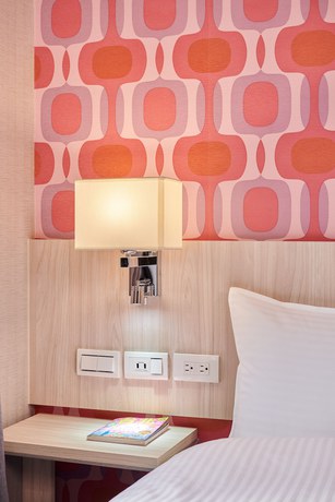 Imagen de la habitación del Hotel COMMA Boutique. Foto 16
