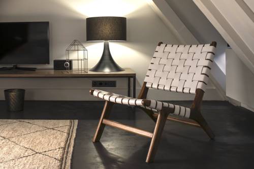 Imagen de la habitación del Hotel COMMUNE suites. Foto 6