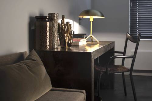 Imagen de la habitación del Hotel COMMUNE suites. Foto 9