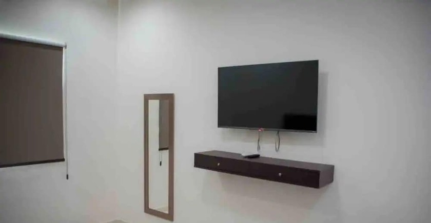 Imagen de la habitación del Hotel CONDOS AA. Foto 10