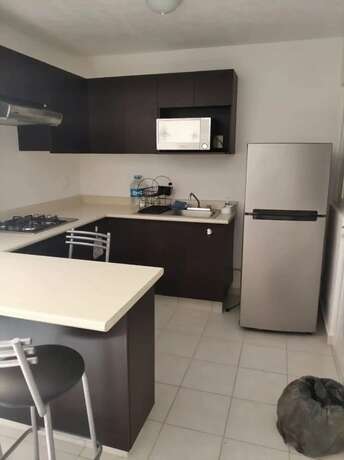 Imagen de la habitación del Hotel CONDOS PGM. Foto 9