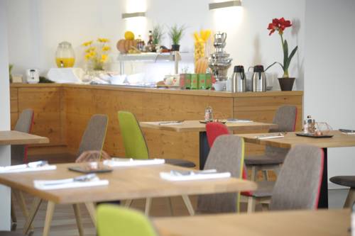 Imagen de la habitación del Hotel COOEE alpin Dachstein. Foto 2