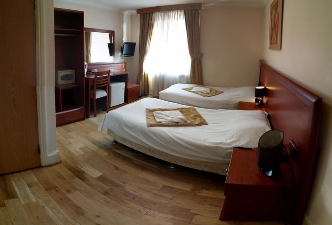 Imagen de la habitación del Hotel CORNER HOUSE, Londres. Foto 16