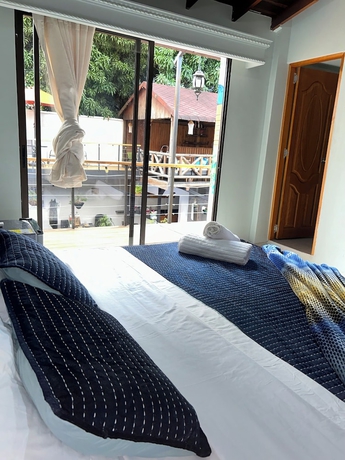 Imagen de la habitación del Hotel CORONA HOUSE. Foto 4
