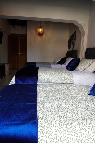 Imagen de la habitación del Hotel CORONA HOUSE. Foto 5