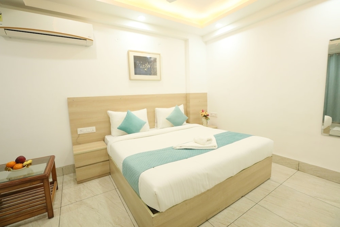 Imagen de la habitación del Hotel CORPORATE STAYS - GOLF COURSE ROAD. Foto 10