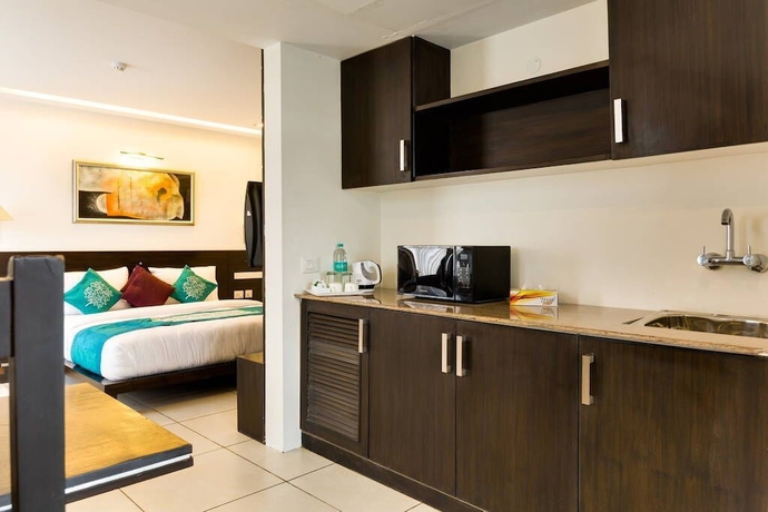 Imagen de la habitación del Hotel CORPORATE STAYS-SUNCITY, Gurugram. Foto 3
