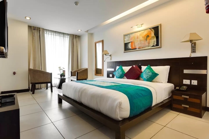 Imagen de la habitación del Hotel CORPORATE STAYS-SUNCITY, Gurugram. Foto 5