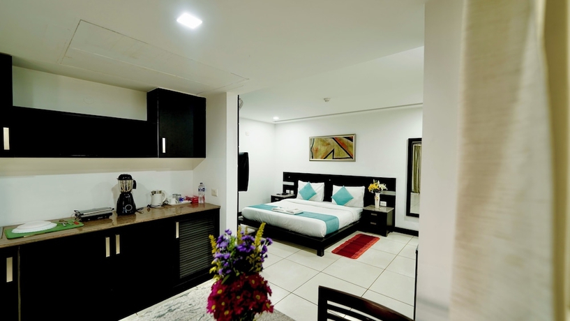 Imagen de la habitación del Hotel CORPORATE STAYS-SUNCITY, Gurugram. Foto 6