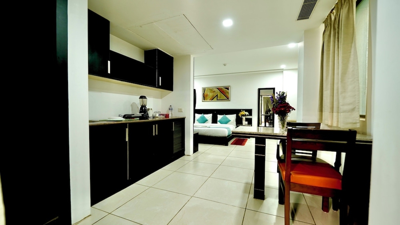 Imagen de la habitación del Hotel CORPORATE STAYS-SUNCITY, Gurugram. Foto 7