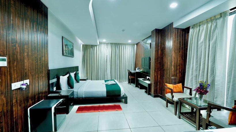Imagen de la habitación del Hotel CORPORATE STAYS-SUNCITY, Gurugram. Foto 8