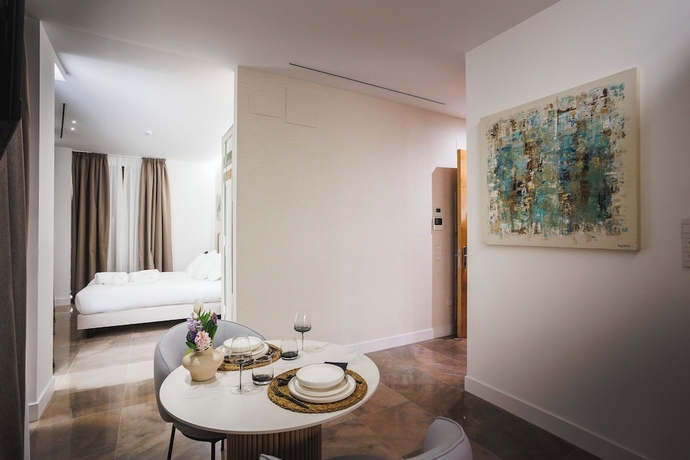 Imagen de la habitación del Hotel CORRAL DEL CARBON GG LUXURY HOTEL BOUTIQUE. Foto 11