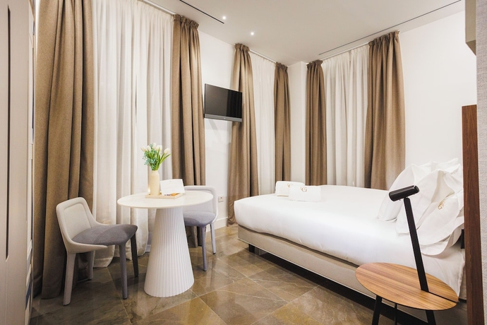 Imagen de la habitación del Hotel CORRAL DEL CARBON GG LUXURY HOTEL BOUTIQUE. Foto 13