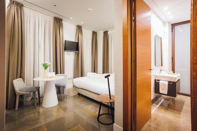 Imagen de la habitación del Hotel CORRAL DEL CARBON GG LUXURY HOTEL BOUTIQUE. Foto 14
