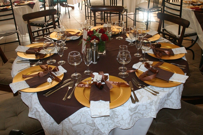 Imagen del bar/restaurante del Hotel COSMOS CUISINE GUEST HOUSE. Foto 3