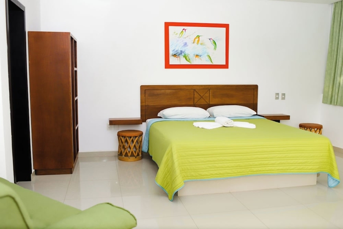 Imagen de la habitación del Hotel COSTA MADERO RESORT. Foto 6
