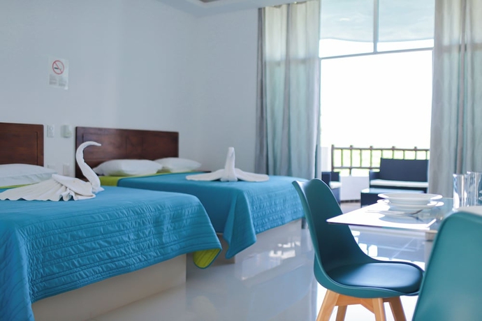 Imagen de la habitación del Hotel COSTA MADERO RESORT. Foto 11