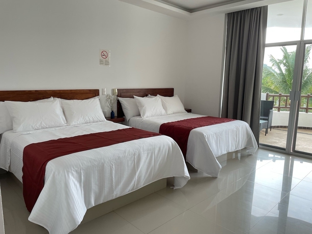 Imagen de la habitación del Hotel COSTA MADERO RESORT. Foto 13