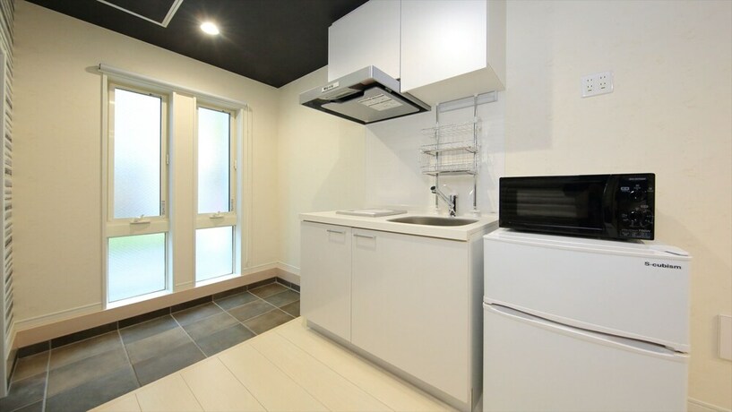 Imagen de la habitación del Hotel COTO Tokyo Koenji. Foto 27