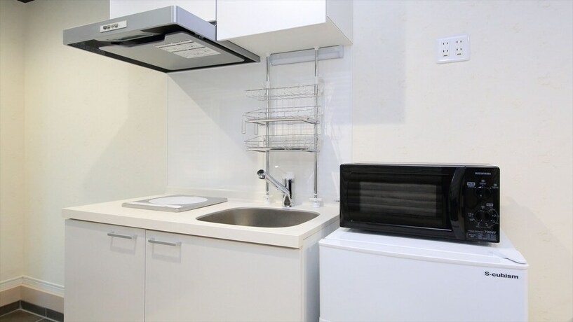 Imagen de la habitación del Hotel COTO Tokyo Koenji. Foto 33