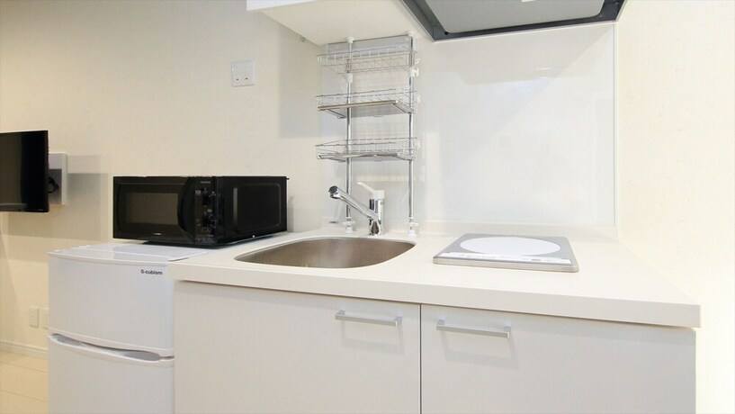 Imagen de la habitación del Hotel COTO Tokyo Koenji. Foto 34