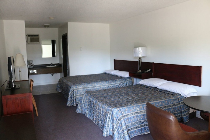Imagen de la habitación del Hotel COUNTRY SQUIRE MOTOR INN. Foto 3