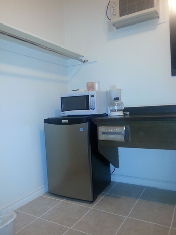 Imagen de la habitación del Hotel COUNTRY SQUIRE MOTOR INN. Foto 7