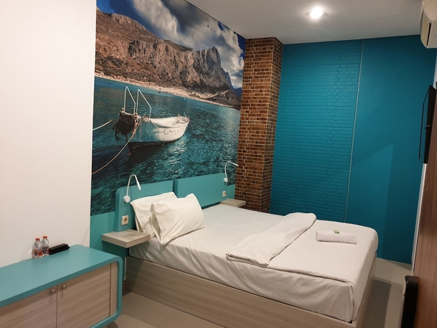 Imagen de la habitación del Hotel COZY CENTRE RESIDENCE SEMARANG. Foto 2