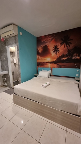 Imagen de la habitación del Hotel COZY CENTRE RESIDENCE SEMARANG. Foto 6