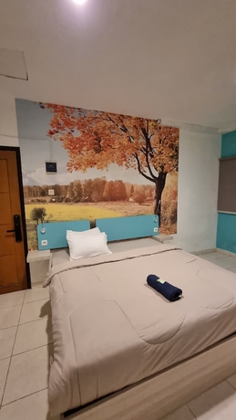 Imagen de la habitación del Hotel COZY CENTRE RESIDENCE SEMARANG. Foto 7