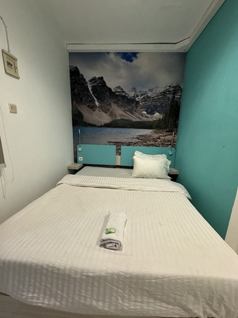 Imagen de la habitación del Hotel COZY CENTRE RESIDENCE SEMARANG. Foto 9