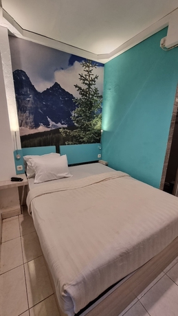 Imagen de la habitación del Hotel COZY CENTRE RESIDENCE SEMARANG. Foto 12