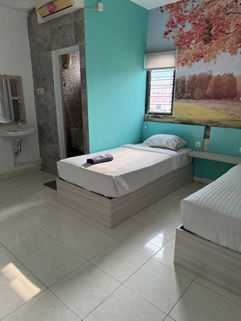 Imagen de la habitación del Hotel COZY CENTRE RESIDENCE SEMARANG. Foto 13