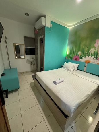 Imagen de la habitación del Hotel COZY CENTRE RESIDENCE SEMARANG. Foto 15