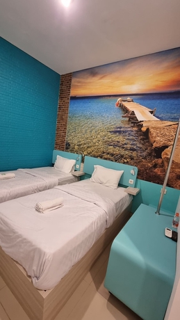 Imagen de la habitación del Hotel COZY CENTRE RESIDENCE SEMARANG. Foto 16