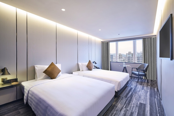 Imagen de la habitación del Hotel COZi Oasis. Foto 9