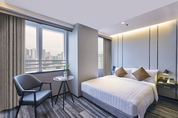 Imagen de la habitación del Hotel COZi Oasis. Foto 16