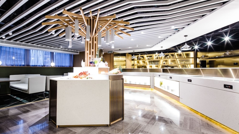 Imagen del bar/restaurante del Hotel COZi Oasis. Foto 3