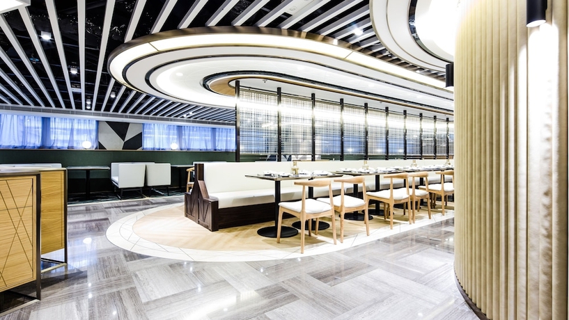 Imagen del bar/restaurante del Hotel COZi Oasis. Foto 7