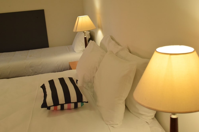 Imagen de la habitación del Hotel CROWN CBD. Foto 5