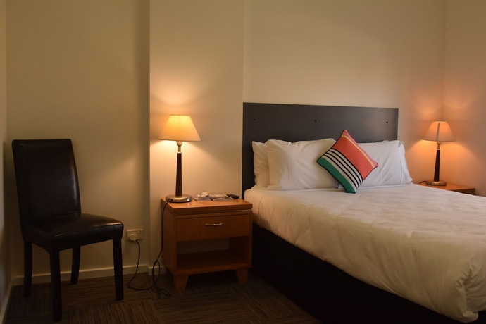 Imagen de la habitación del Hotel CROWN CBD. Foto 7