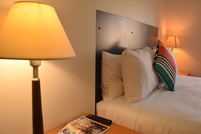 Imagen de la habitación del Hotel CROWN CBD. Foto 8