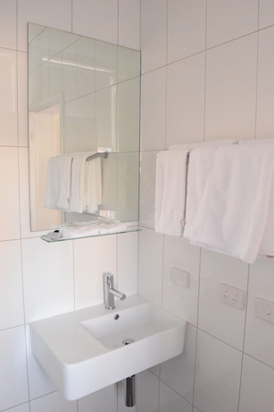 Imagen de la habitación del Hotel CROWN CBD. Foto 15