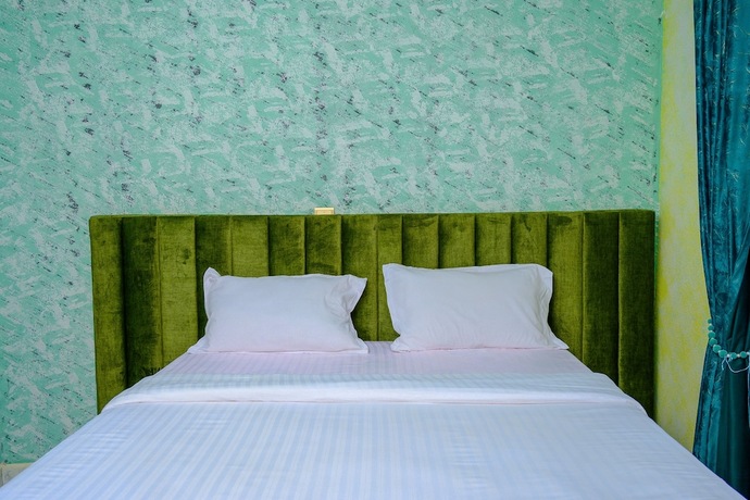 Imagen de la habitación del Hotel CROYLANDZ COTTAGES. Foto 18